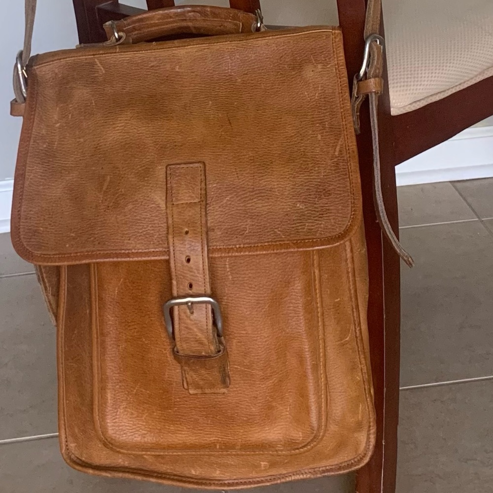 Beautifully distressed leather crossbody bag